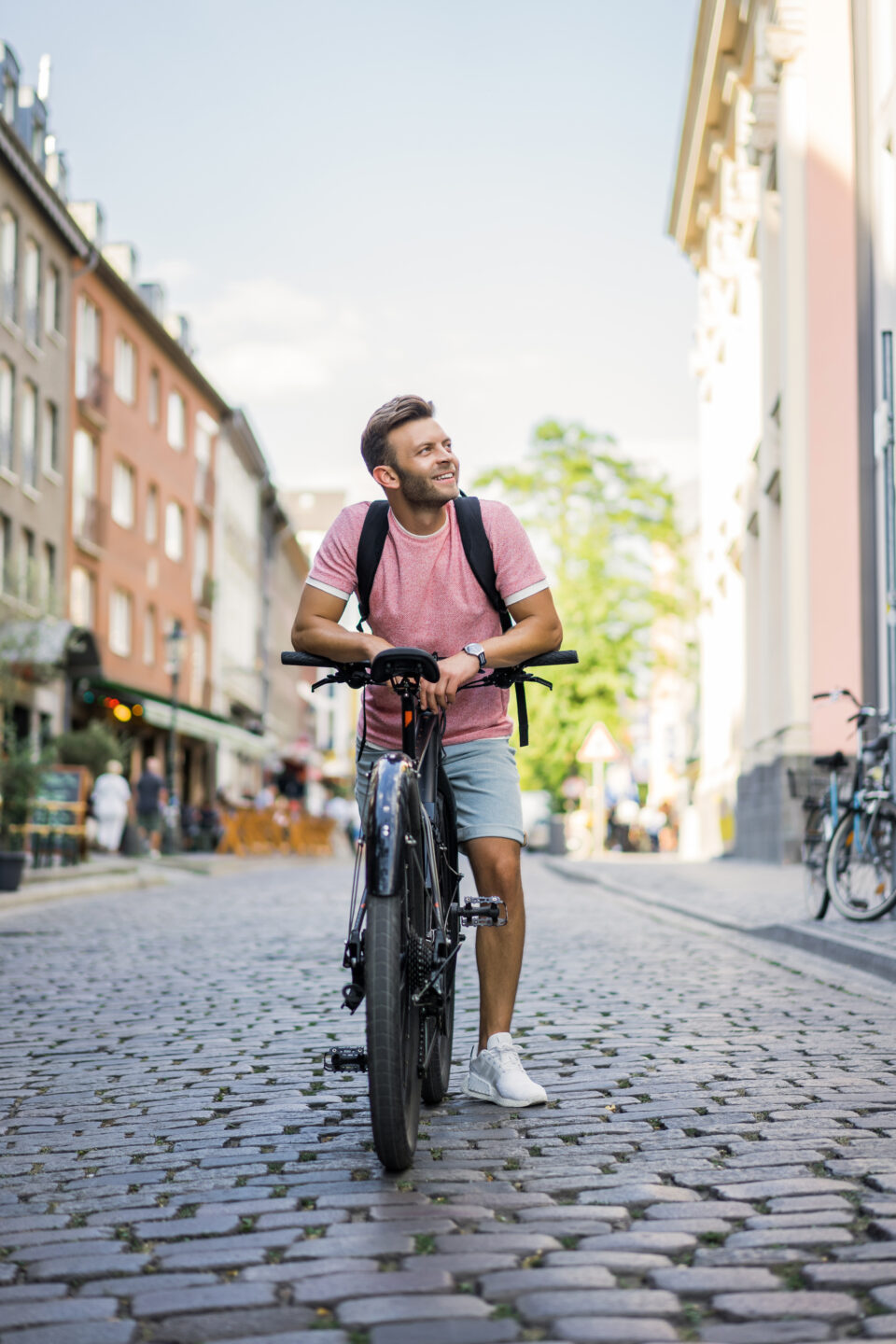 Young Sports Man On A Bicycle In A European City. Sports In Urba